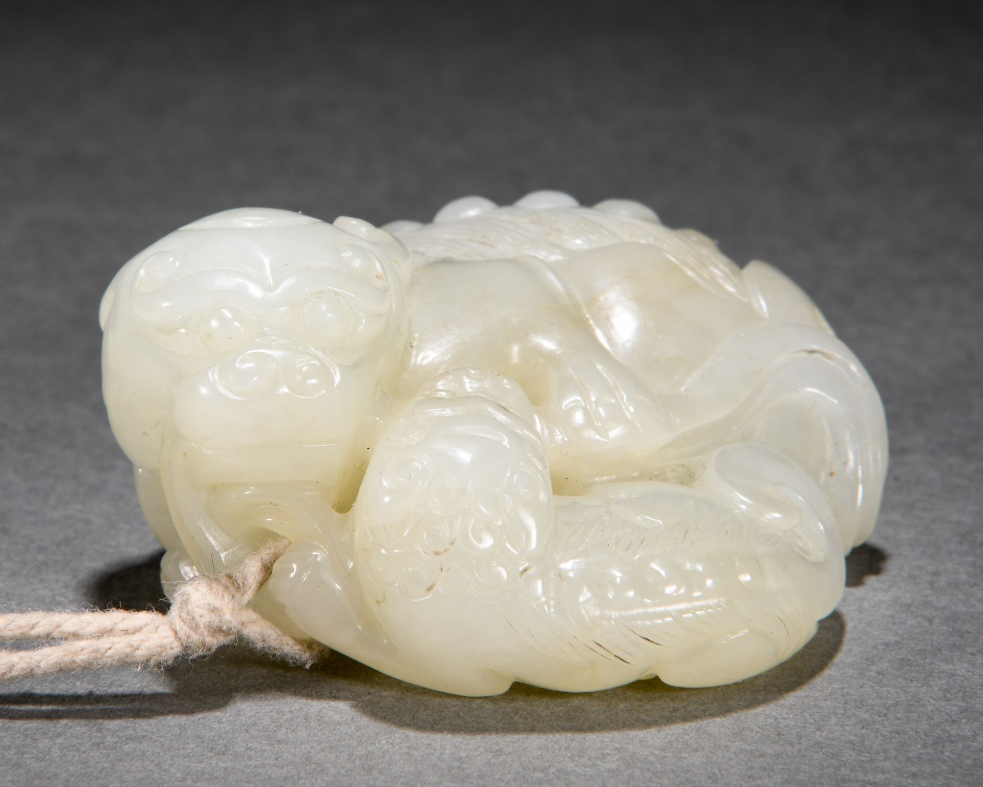 A Chinese Carved White Jade Beast - Image 4 of 6