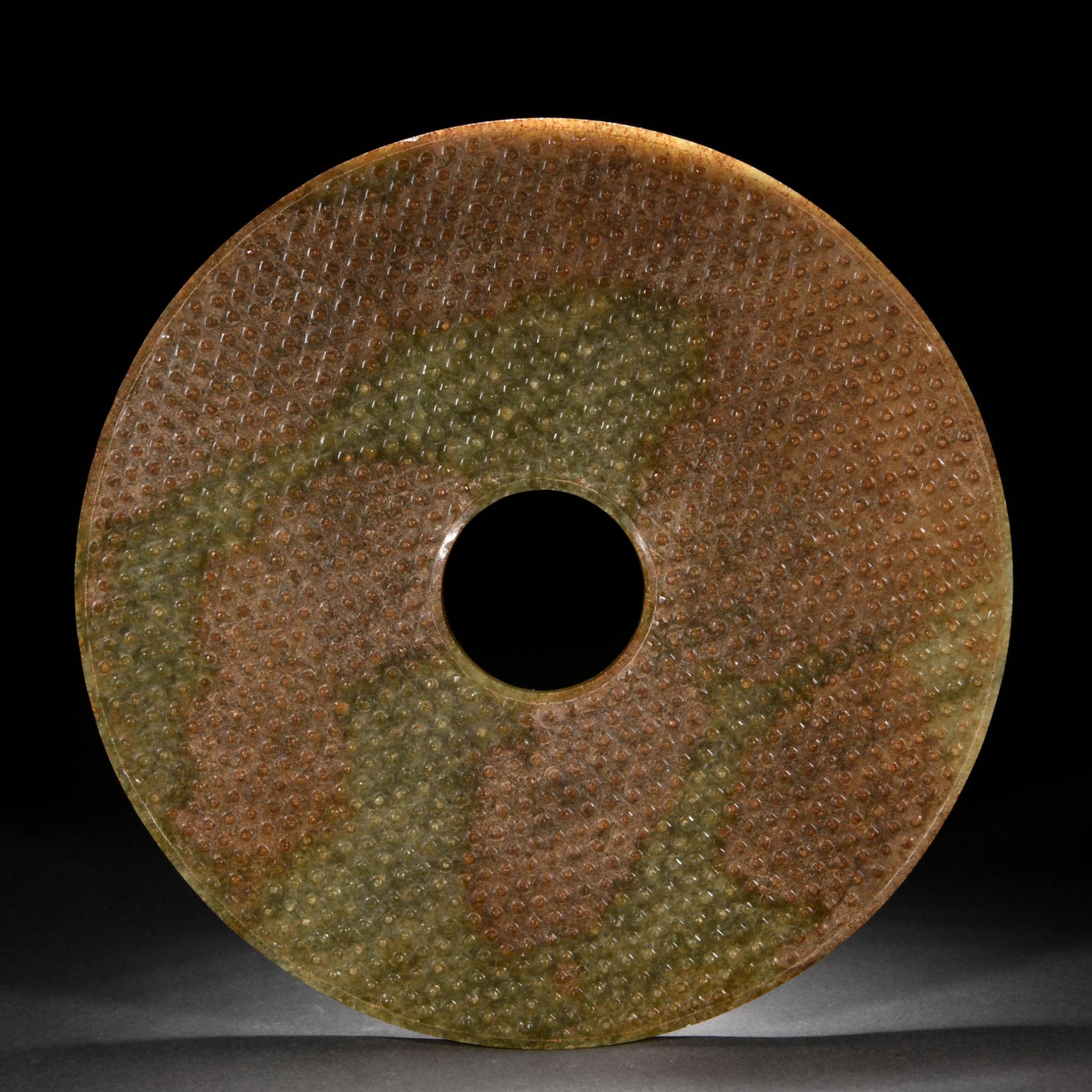 A Chinese Carved Jade Disc Bi