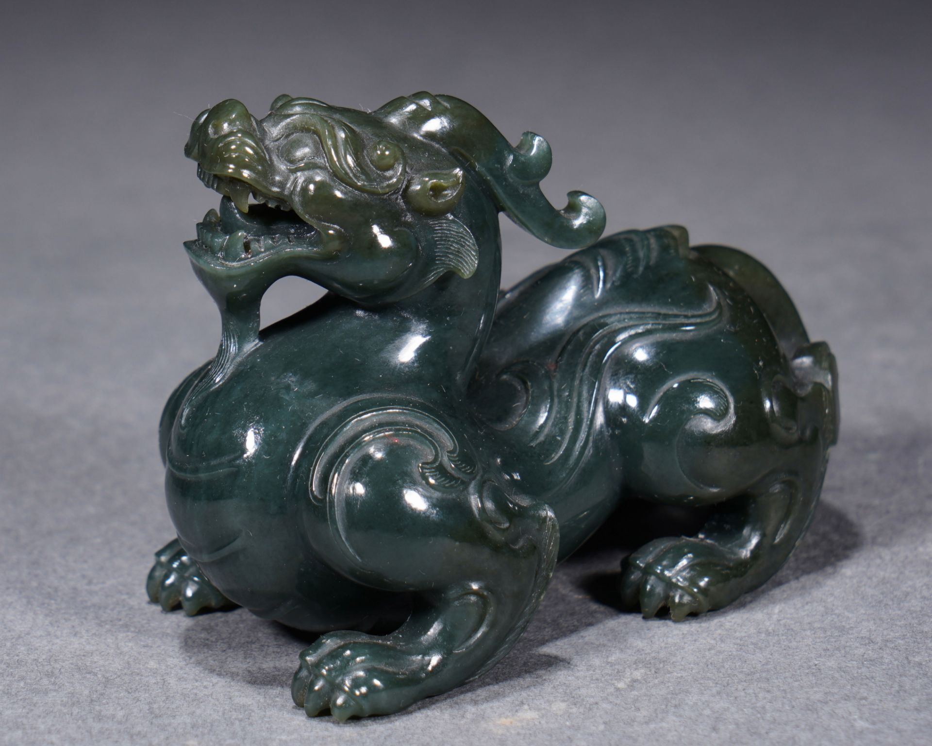 A Chinese Carved Spinach Green Jade Mythical Beast Pixiu - Image 3 of 9