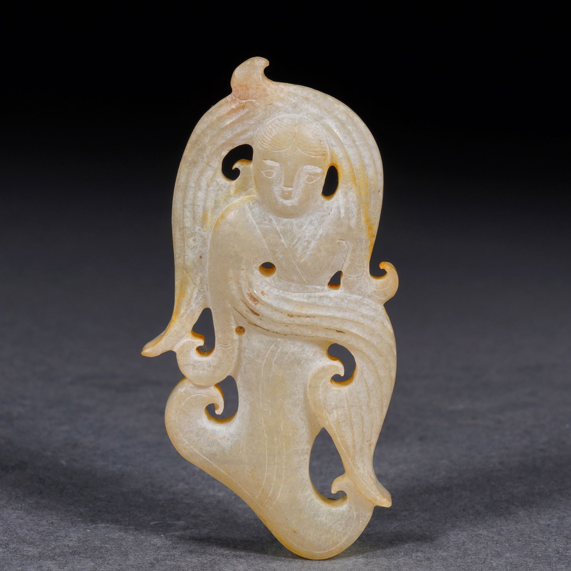 A Chinese Carved White Jade Dancing Figure