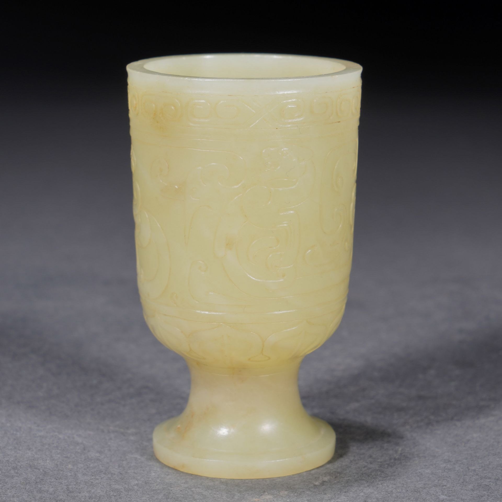 A Chinese Archaistic Carved Yellow Jade Goblet - Image 4 of 9