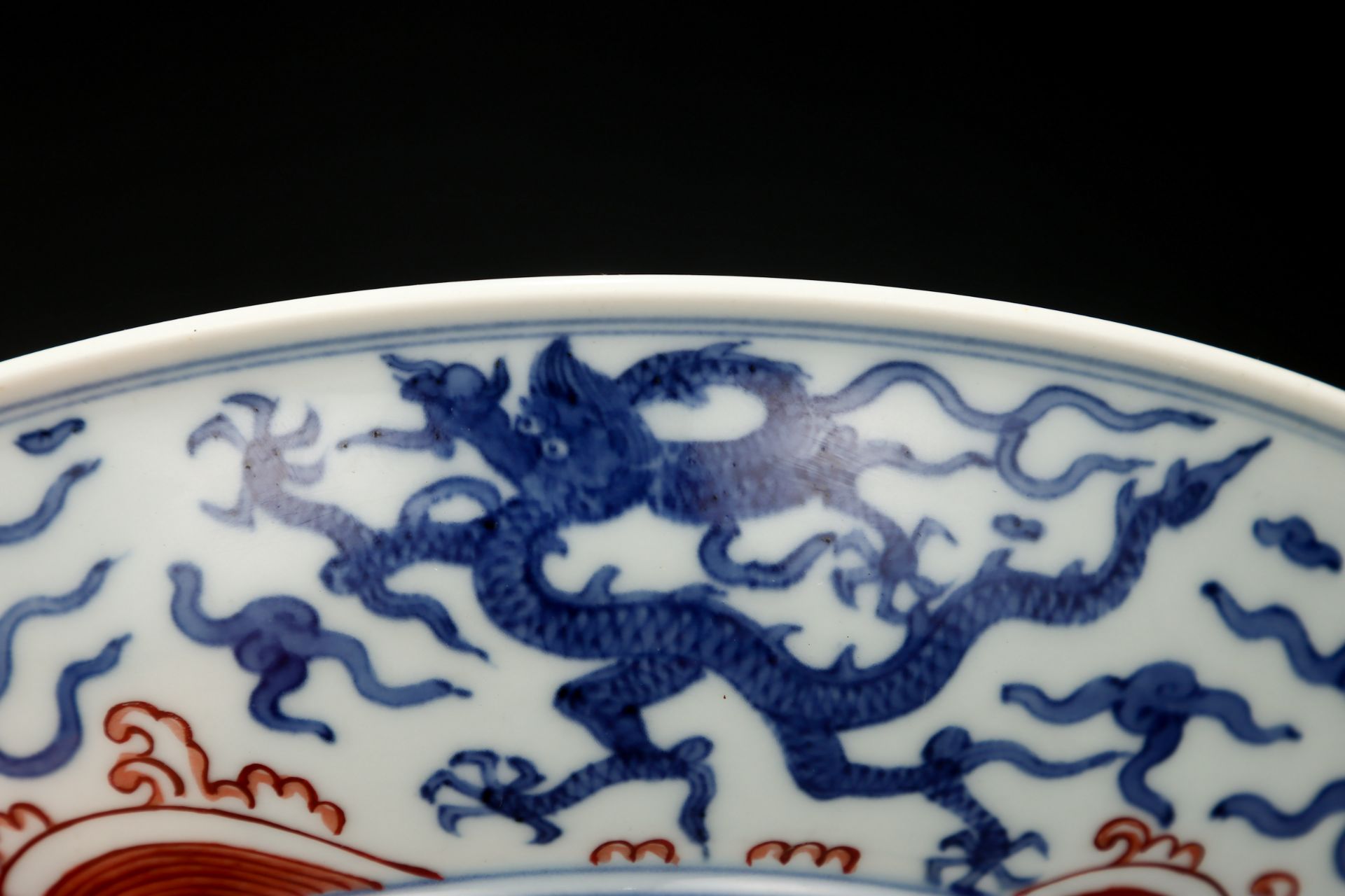 A Chinese Underglaze Blue and Iron Red Dragon Plate - Image 9 of 9