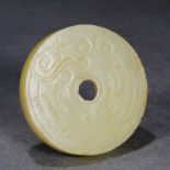 A Chinese Archaistic Yellow Jade Disc Bi