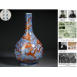 A Chinese Underglaze Blue and Iron Red Dragon Bottle Vase