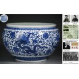 A Chinese Blue and White Dragon Jardiniere