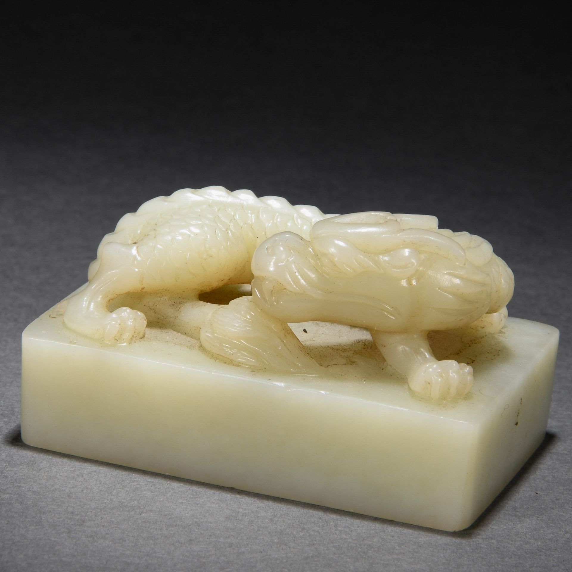 A Chinese Carved White Jade Mythical Beast Seal