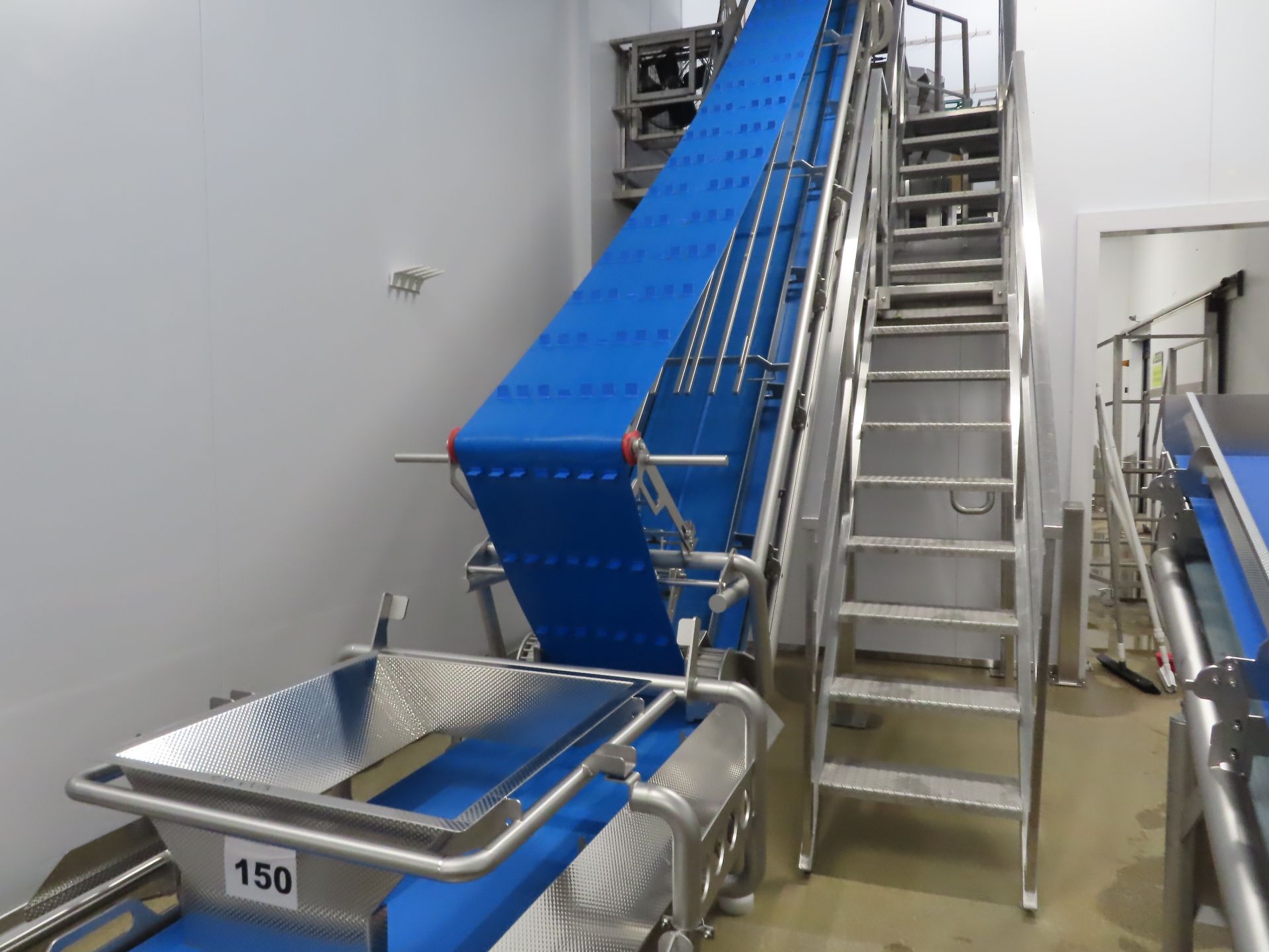 FELTRACON ELEVATED CONVEYOR.