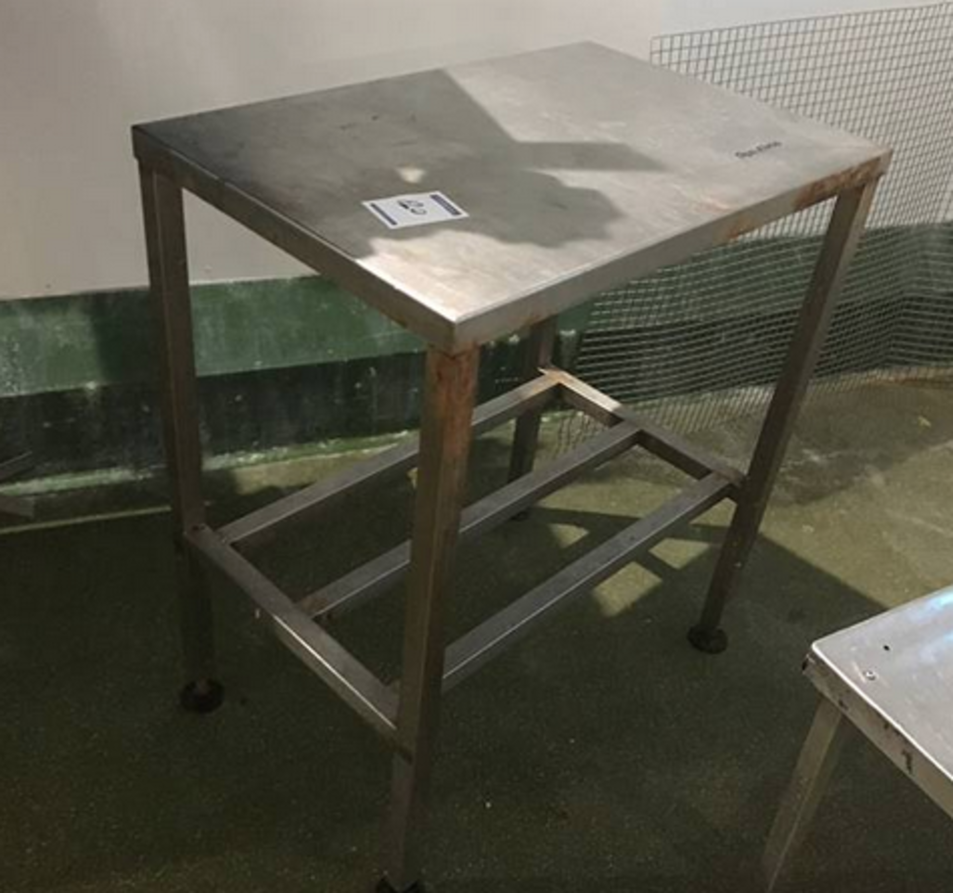 STAINLESS STEEL TABLE.