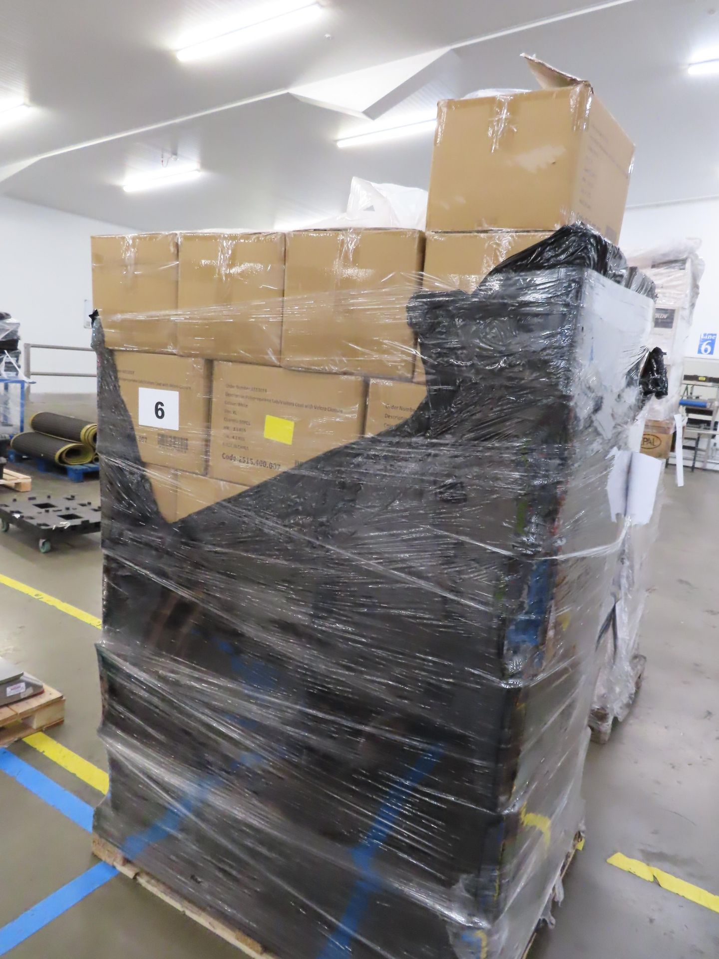 PALLET OF DISPOSABLE WHITE COATS.