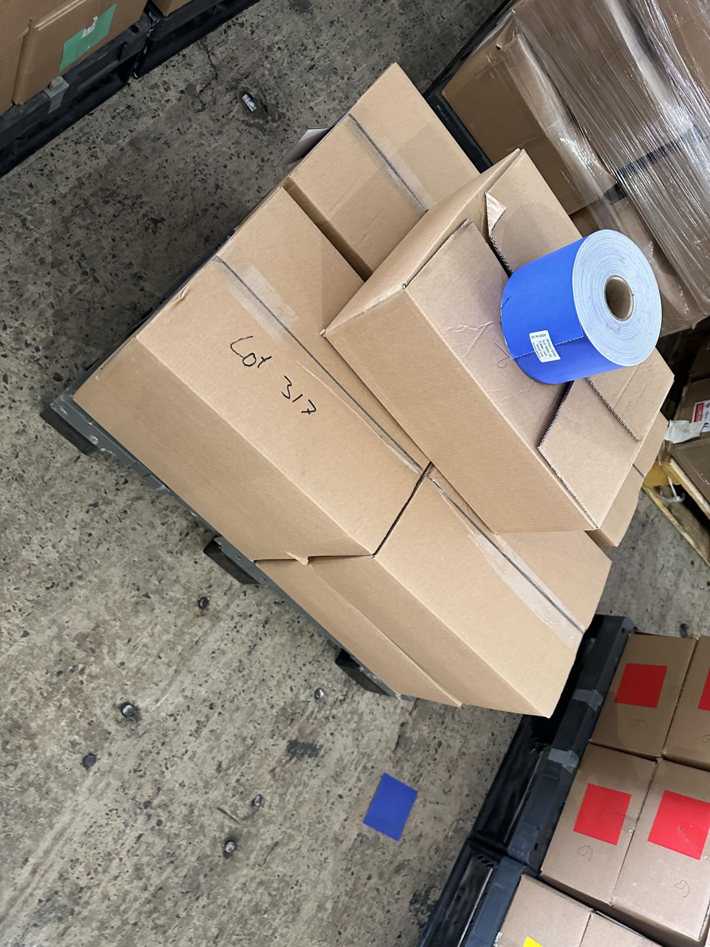 9 X BOXES BLUE TAGS.
