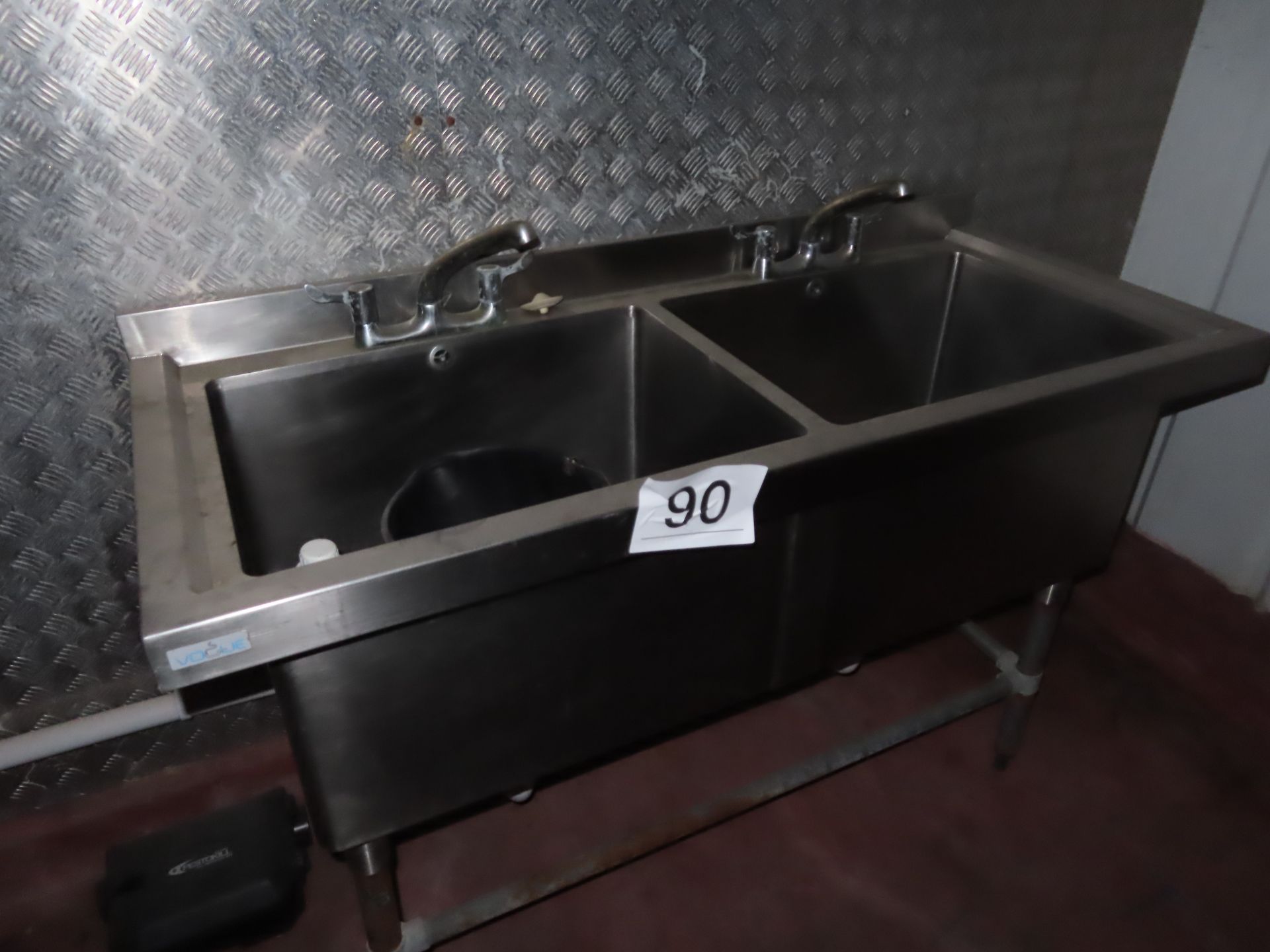 STAINLESS STEEL DOUBLE SINK.