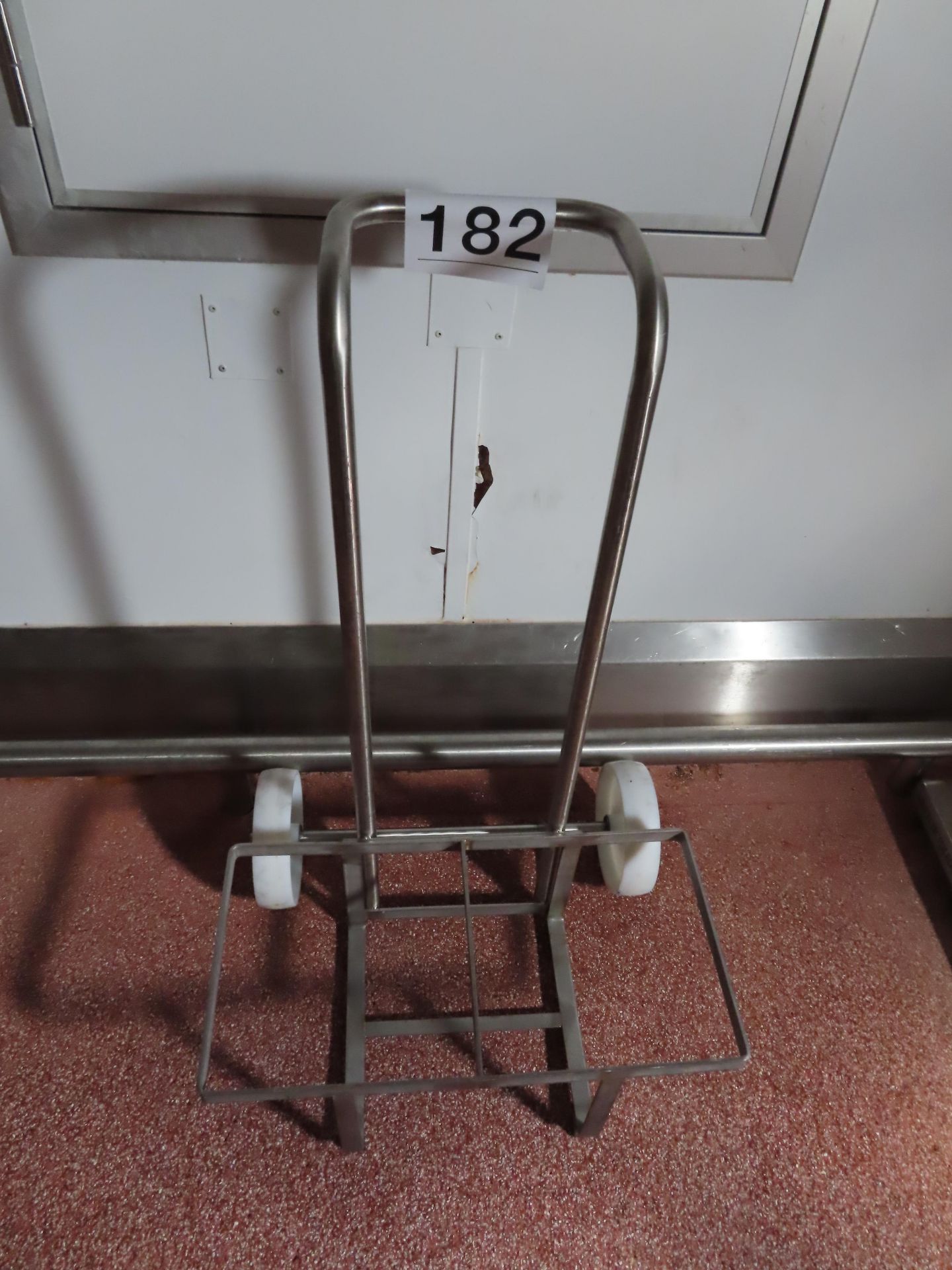 STAINLESS STEEL CHEMICAL TROLLEY.