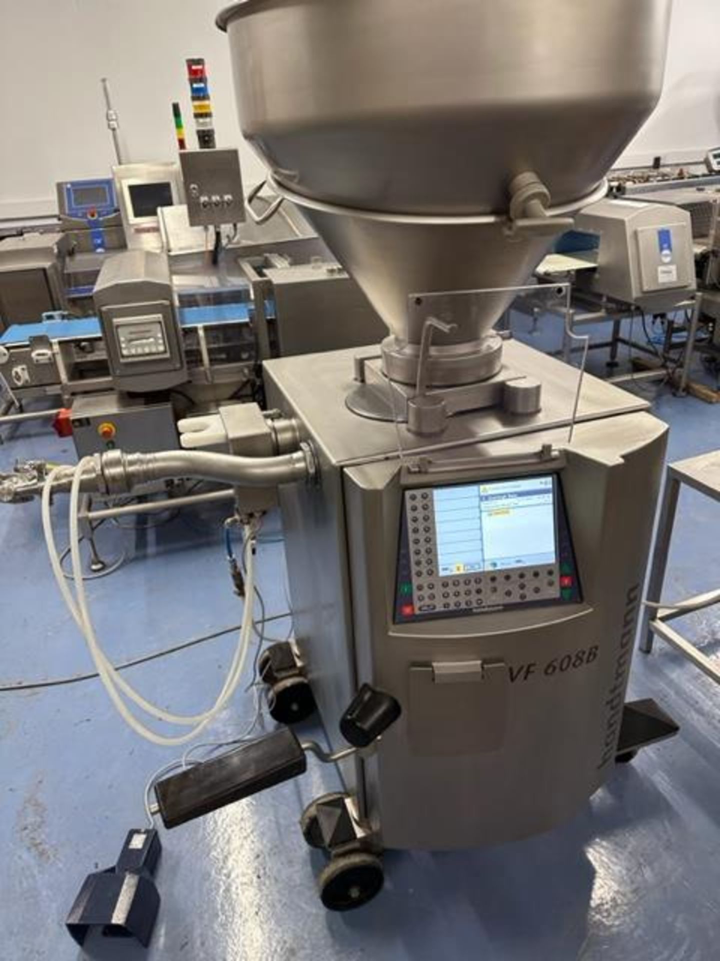 HANDTMANN VF608B MOBILE VACUUM FILLER, AS NEW. WITH LOTS OF SPARES.