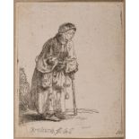 Rembrandt van Rijn (1606-1669) A Beggar Woman Leaning on a Stick
