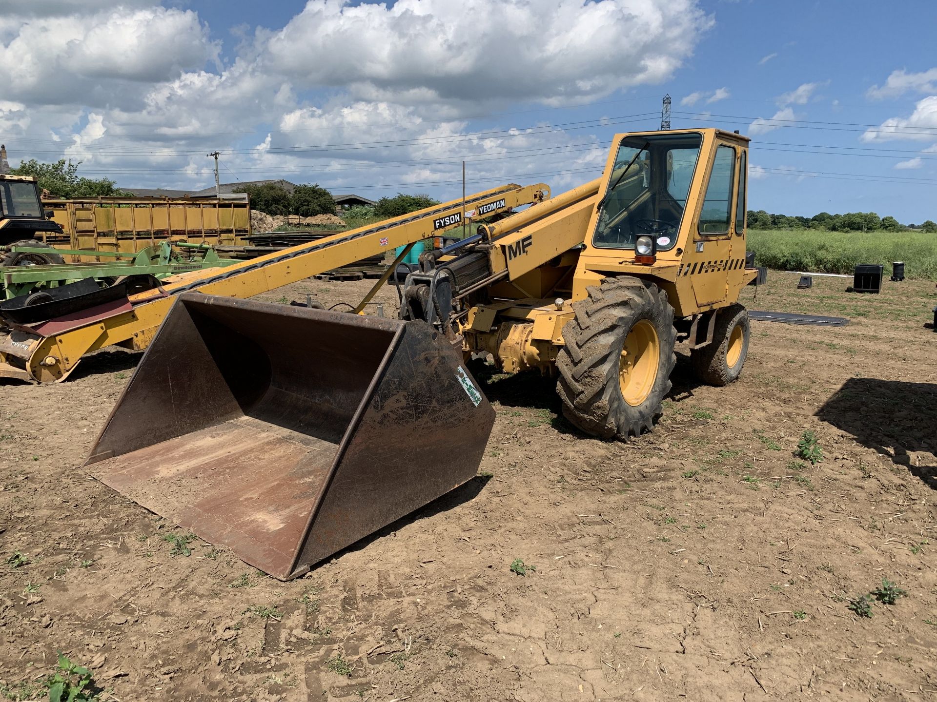 Massey Ferguson 24 telehandler, C667 OEG, 5842 hours, with grain bucket