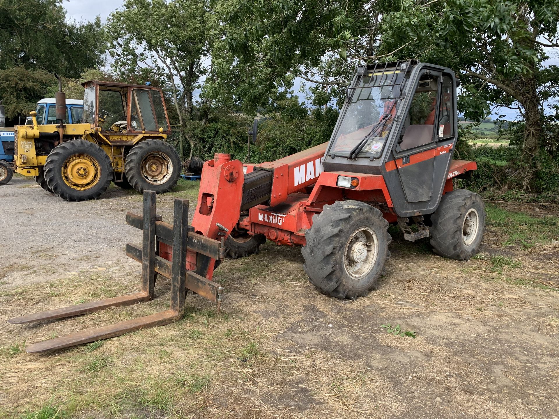 Manitou MT840 CP Turbo telehandler, 6415 hours, with pallet tines