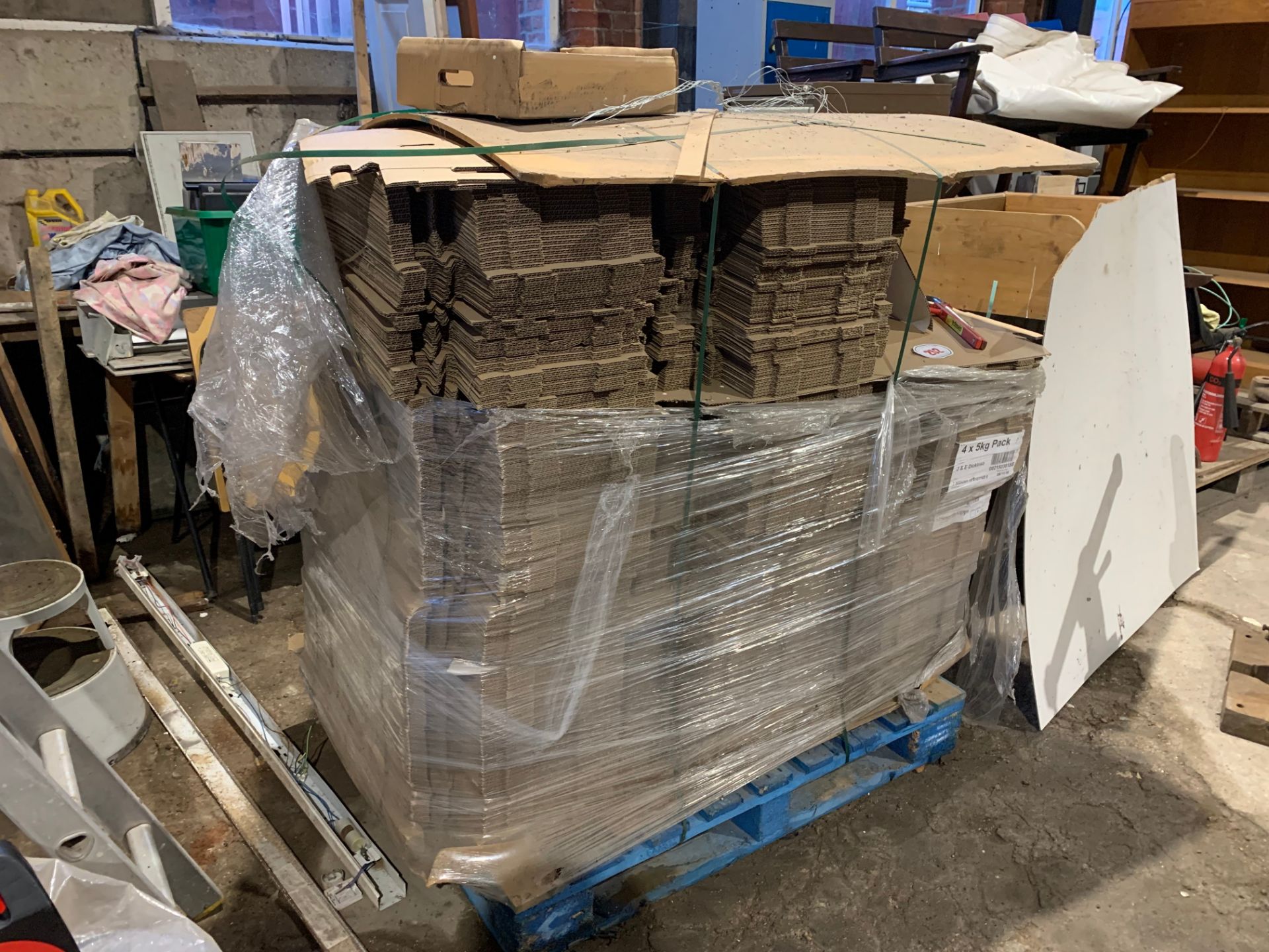 Pallet of flat pack cardboard boxes