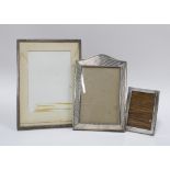 Three 20th century silver photograph frames to include Birmingham 1925 (largest 17 x 23cm) & 1961,