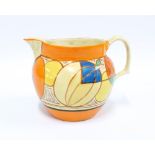Clarice Cliff Melon pattern jug, hand painted in yellow, green, orange and blue, between orange an