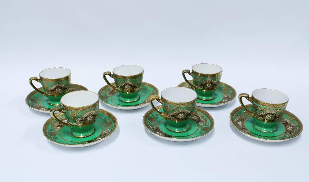 Noritake set of six coffee cups and saucers, green ground with black, white enamelled pattern and