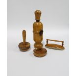 A collection of fruitwood and boxwood items to include a tape measure, nail buffer and darning