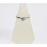 Platinum diamond solitaire ring, the claw set round brilliant cut diamond is approx 0.70ct,
