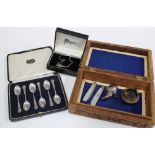 Cased set of six silver teaspoons, London 1925, two mother of pearl fruit knives with silver blades,