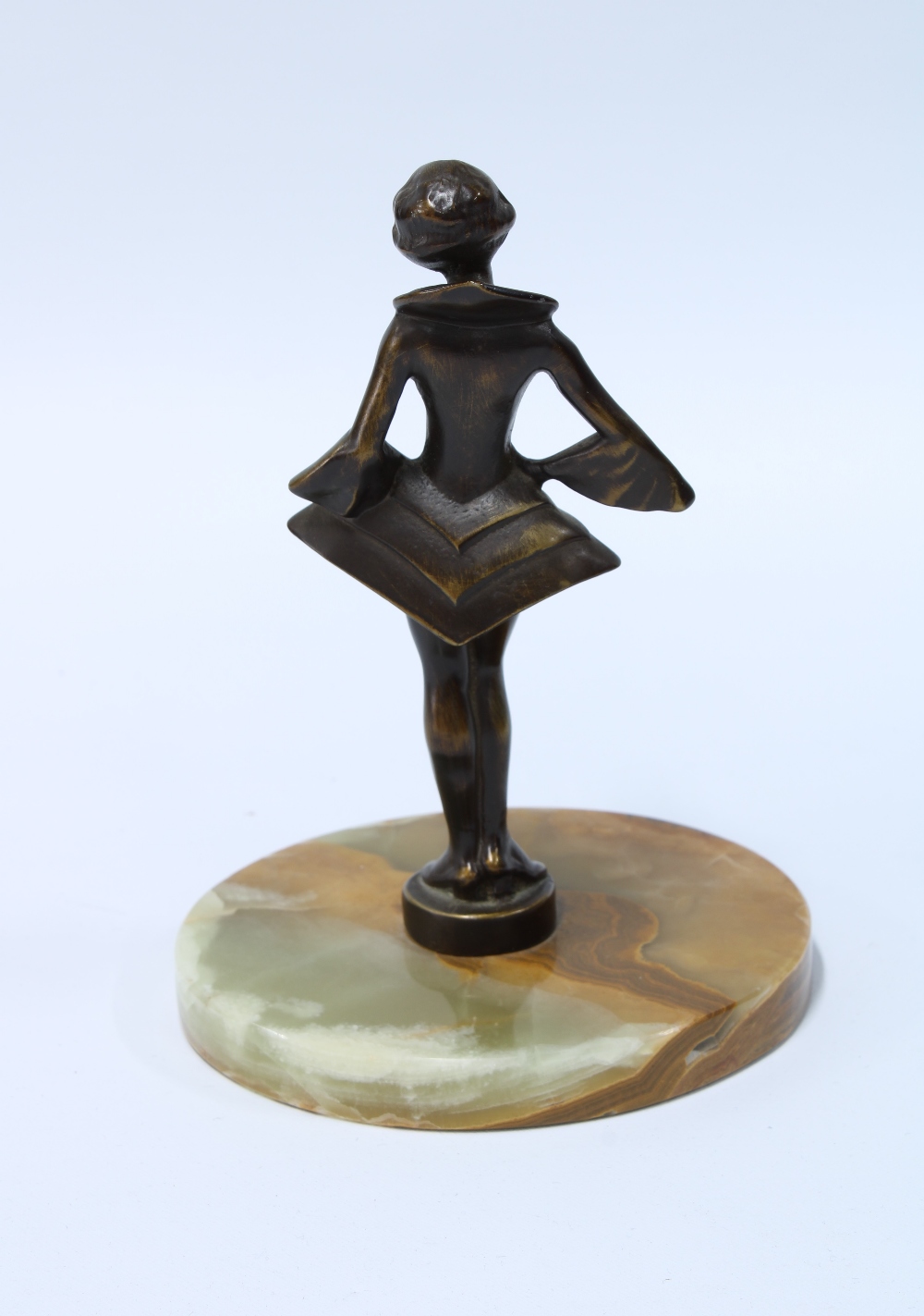 Art Deco style bronze patinated metal figure of a girl in stylistic dress, on a hardstone base, 15cm - Image 2 of 2