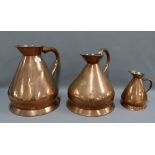 A Dring & Fage three Gallon copper jug, a Victorian 2 Gallon copper jug and a half gallon copper jug