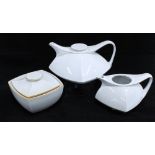 Montgolfier, France three piece teaset with teapot, cream jug and sugar bowl, white glazed and of