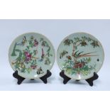 Two Chinese celadon glazed plates decorated with butterflies and flowers in coloured enamels, (2) (