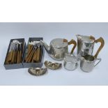 Piquot Ware tea and coffee set, pair of Cohr Danish stainless steel candlesticks and a set of