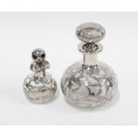 Two silver overlaid glass scent bottles with stoppers, 12 & 8 cm (2)