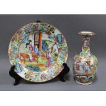 Chinese Canton famille rose vase and plate, typically painted with figures, precious objects and