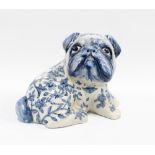 Blue and white pottery pug dog, 24cm long