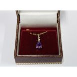 9ct gold amethyst and diamond pendant on a 9ct gold chain
