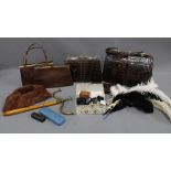 A collection of vintage leather handbags and purses, fur hat, ostrich feathers , buttons, hatpins,