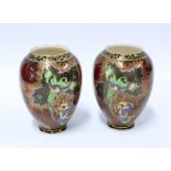 A pair of Crown Devon red lustre vases, painted with parrots in pattern 2114, 13cm (2)