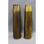 Two brass shell cases, base inscribed 11/63 CY N39 MKI, 64cm high (2)