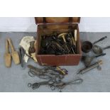 A large collection of vintage kitchenalia to include whisks, butter pats, piping instruments, etc (a