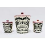 Rare Gray's Pottery set of three pink lustre storage jars with black and white dolphin pattern,