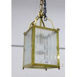 Brass and glass panelled hanging lantern. 36cm.