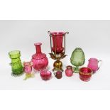 Collection of Victorian and Edwardian coloured glass to include cranberry glass and uranium glass,