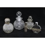 Edwardian silver mounted glass scent bottle, Chester 1907, together with two cut glass scent bottles