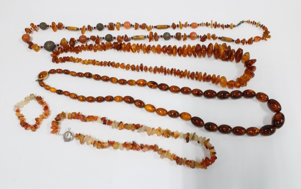 Four strands of amber beads and a bracelet (5)