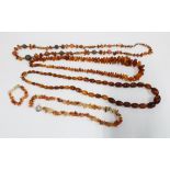 Four strands of amber beads and a bracelet (5)