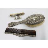 Edwardian silver backed hair brush and comb, Chester 1907 and a silver backed nail buffer (3)
