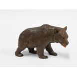 Black Forest carved wood bear, modelled standing on a all fours, 10cm