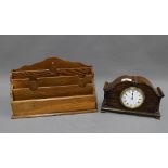 Mahogany mantle clock together with an oak newspaper rack. 23 x 35cm. (2)