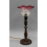 Oak table lamp base with frilled shade in opaque and cranberry glass, 39cm including shade